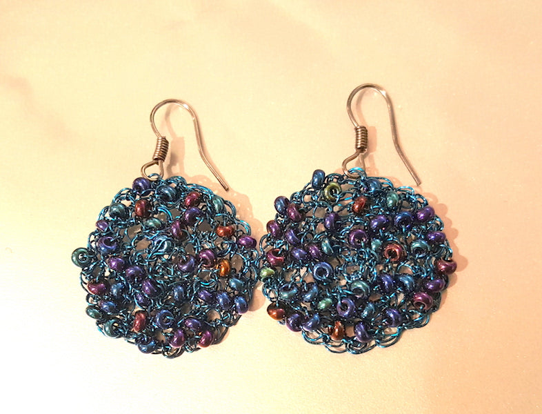 Hand braided earrings with beads