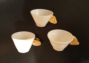 Cup with gilded wings